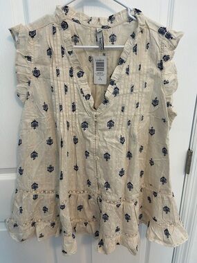 torrid Cream Blouse with Navy Floral Print and Ruffle Hem